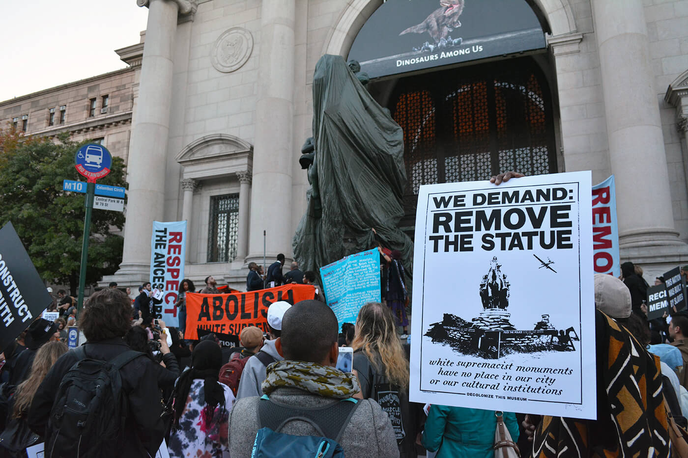 #DecolonizeThisPlace protestors cover the Equestrian Statue of Theodore Roosevelt at the American Museum of Natural History on October 10, 2016.