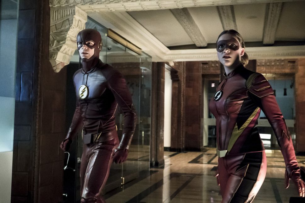 Grant Gustin as The Flash and Violett Beane as Jesse Quick.