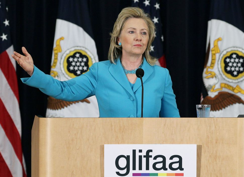 Then-U.S. Secretary of State Hillary Clinton speaks about human rights during a event co-hosted by the Department of State, and Gays and Lesbians in Foreign Affairs Agencies (GLIFAA), at the State Department on June 27, 2011 in Washington, DC. During the event Secretary Clinton was presented with the GLIFAA Equality Award