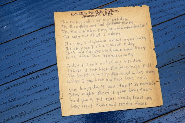 NEW YORK, NY - SEPTEMBER 18: Bob Dylan's originally handwritten lyrics for "California Brown Eyed Baby" on display at private media viewing at "Gotta Have It!" gallery store on September 18, 2013 in New York City. Dispayed items would be auctioned online at GottaHaveRockandRoll.com from Wednesday, September 18th at 10 am through September 27th. (Photo by Slaven Vlasic/Getty Images)