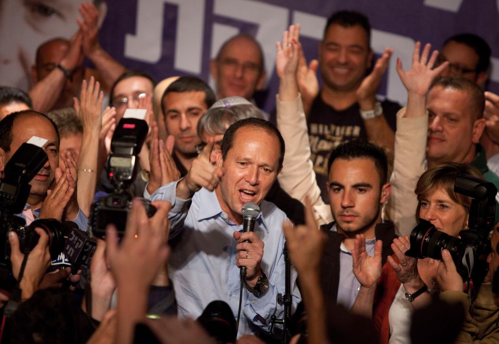 Jerusalem Mayor Nir Barkat (C) speaks to supporters after winning the Jerusalem mayoral election on October 23, 2013 in Jerusalem, Israel.