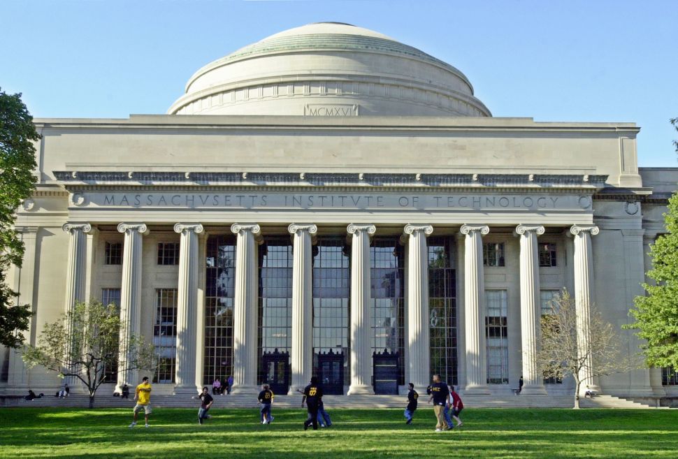 Massachusetts Institute of Technology students play football outside the Maclaurin building. The school took the second place spot in the WSJ's recent ranking of US colleges.