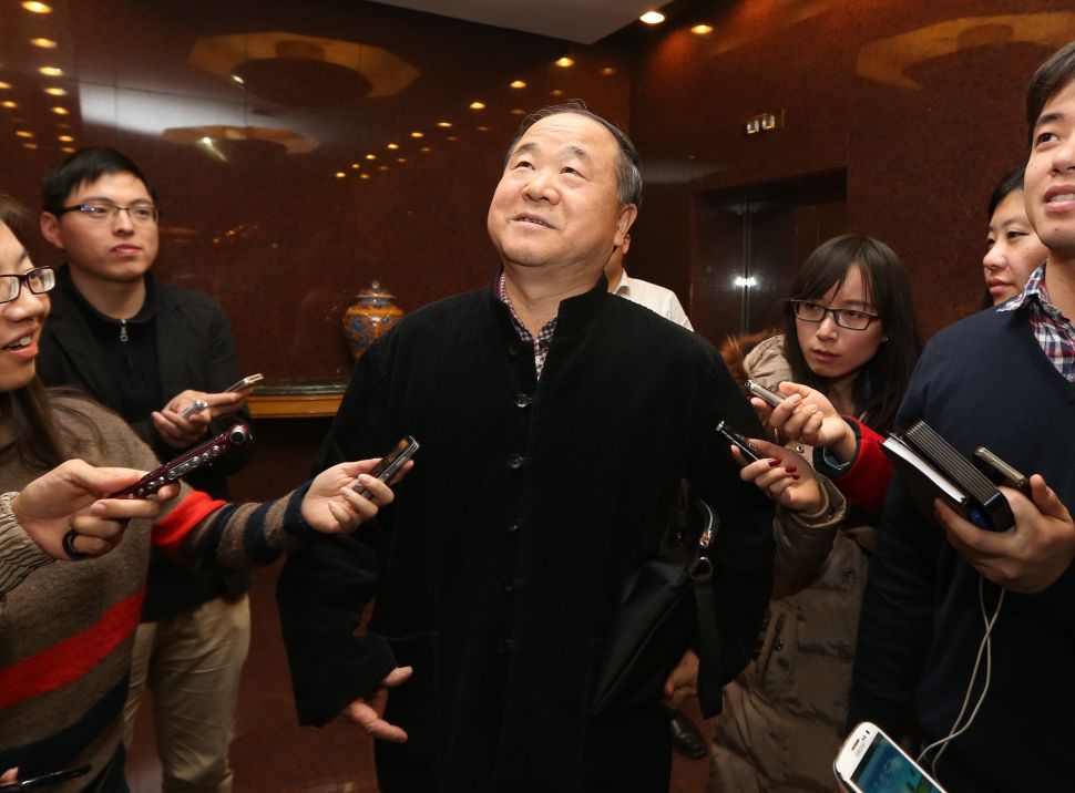 Chinese Literature Nobel laureate Mo Yan attends the the second session of the 12th National Committee of CPPCC at the The Great Hall of the People on March 4, 2014 in Beijing, China.