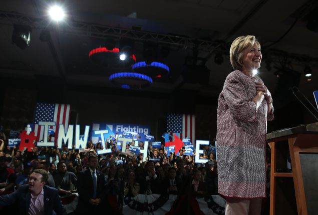 Hillary Clinton in her $12,495 Giorgio Armani jacket.
