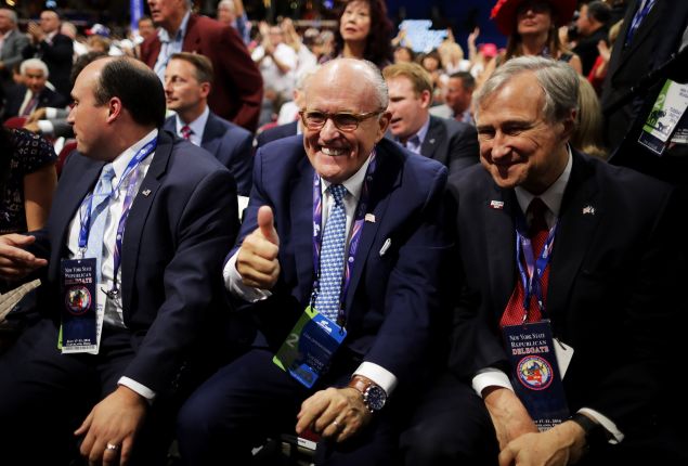 Former Mayor Rudolph Giuliani gives a thumbs up as New York GOP Chairman Ed Cox, looks on at the Republican National Convention.