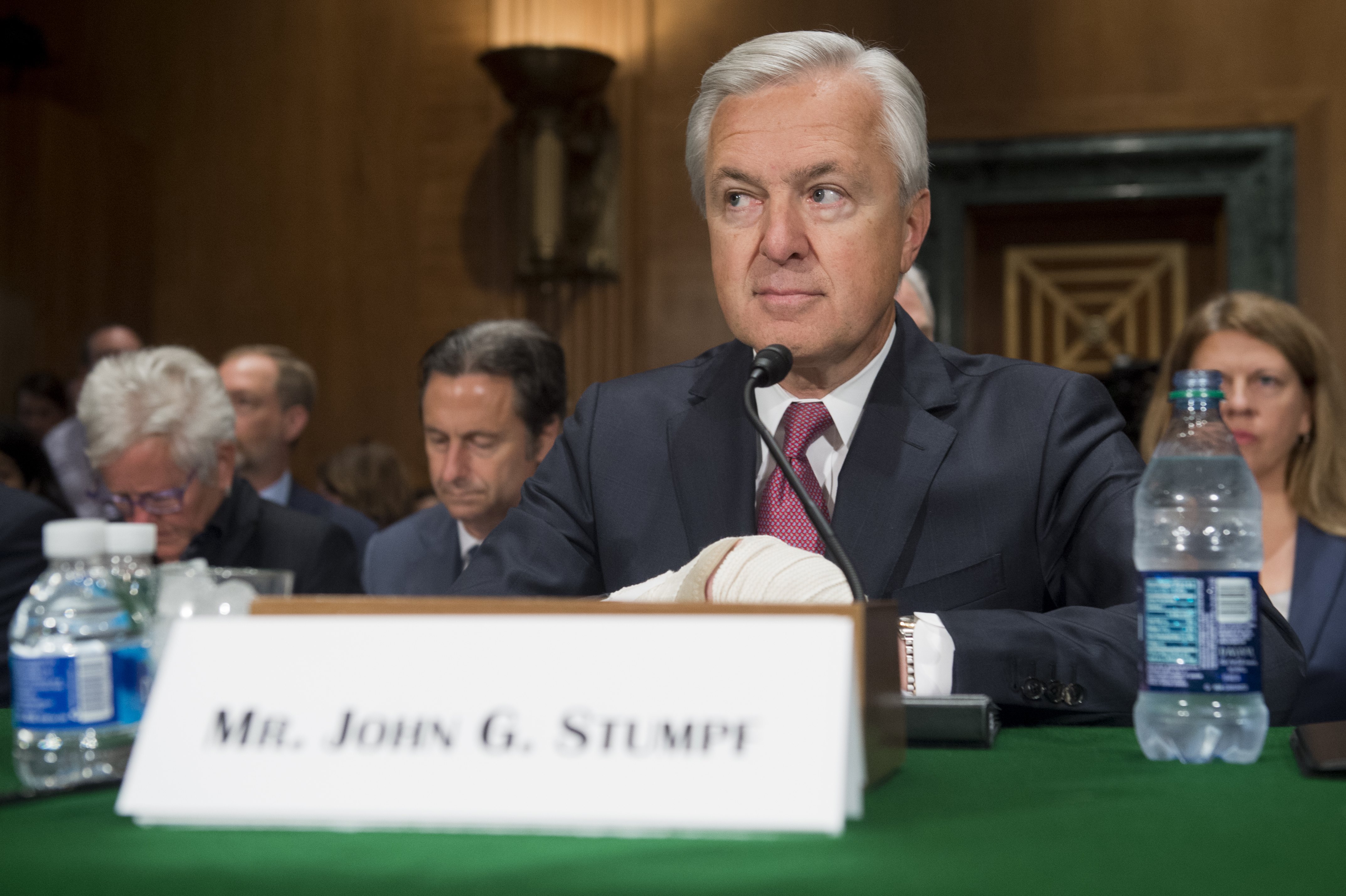 John Stumpf, chairman and CEO of Wells Fargo, arrives to testify about the unauthorized opening of accounts by Wells Fargo during a Senate Banking, Housing and Urban Affairs Committee hearing on Capitol Hill in Washington, DC, September 20, 2016.
