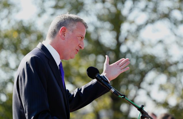 New York Mayor Bill de Blasio speaks as he attends a ceremony to unveil plans and break ground for a new Statue of Liberty Museum on Liberty Island in New York on October 6, 2016.