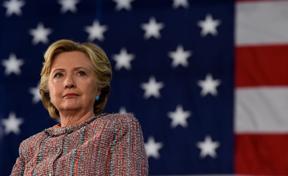 Democrat Presidential nominee Hillary Clinton looks on during an event on climate change at Miami Dade College-Kendall Campus in Miami, Florida October 11, 2016.
