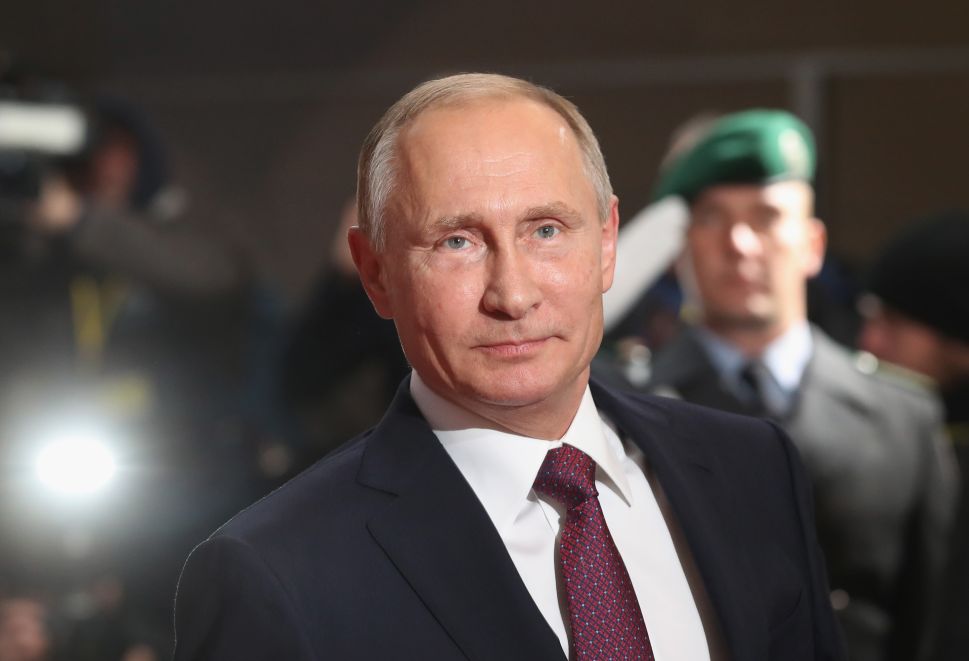 Russian President Vladimir Putin walks with German Chancellor Angela Merkel (not pictured) upon his arrival to discuss the Ukrainian peace process at the Chancellery on October 19, 2016 in Berlin, Germany. The leaders of Russia, Ukraine, France and Germany, known as the Normandy Four, are meeting to discuss implementation of the peace plan known as the Minsk Protocol, a roadmap for resolving the conflict in Ukraine after Russian forces invaded in 2014 and annexed the peninsula of Crimea. The United States has threatened renewed sanctions on Russia if the country did not either implement the plan in the coming months or arrive at a plan on how to do so.