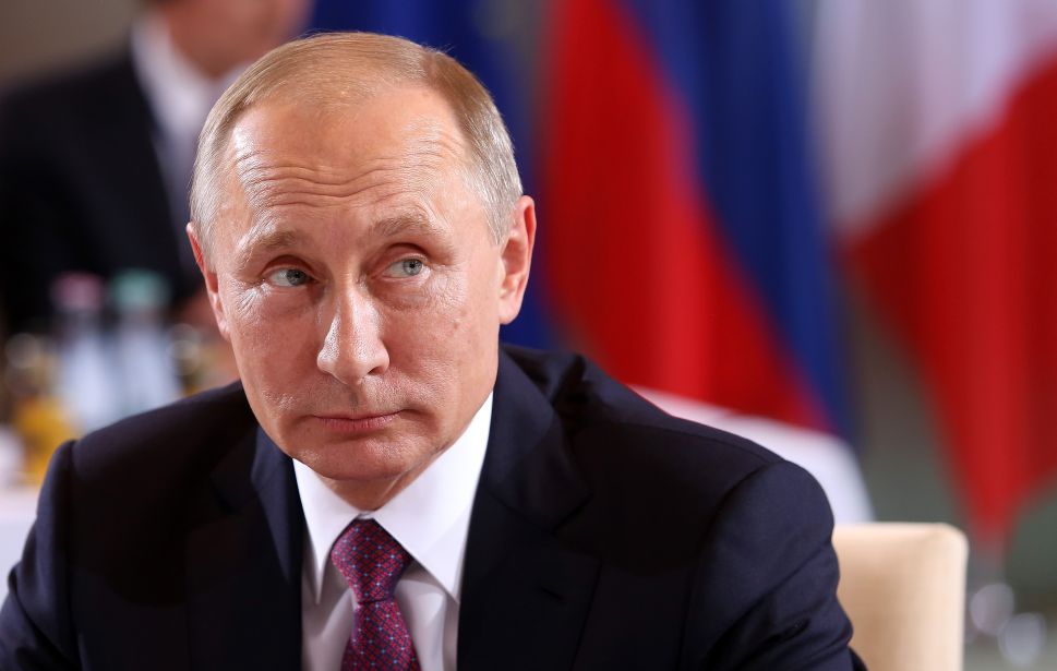 BERLIN, GERMANY - OCTOBER 19: Russian President Vladimir Putin attends a meeting to discuss the Ukrainian peace process at the German federal Chancellery on October 19, 2016 in Berlin, Germany. The leaders of Russia, Ukraine, France and Germany, known as the Normandy Four, met in Berlin to discuss implementation of the peace plan known as the Minsk Protocol, a roadmap for resolving the conflict in Ukraine after Russian forces invaded in 2014 and annexed the peninsula of Crimea. The United States has threatened renewed sanctions on Russia if the country did not either implement the plan in the coming months or arrive at a plan on how to do so.