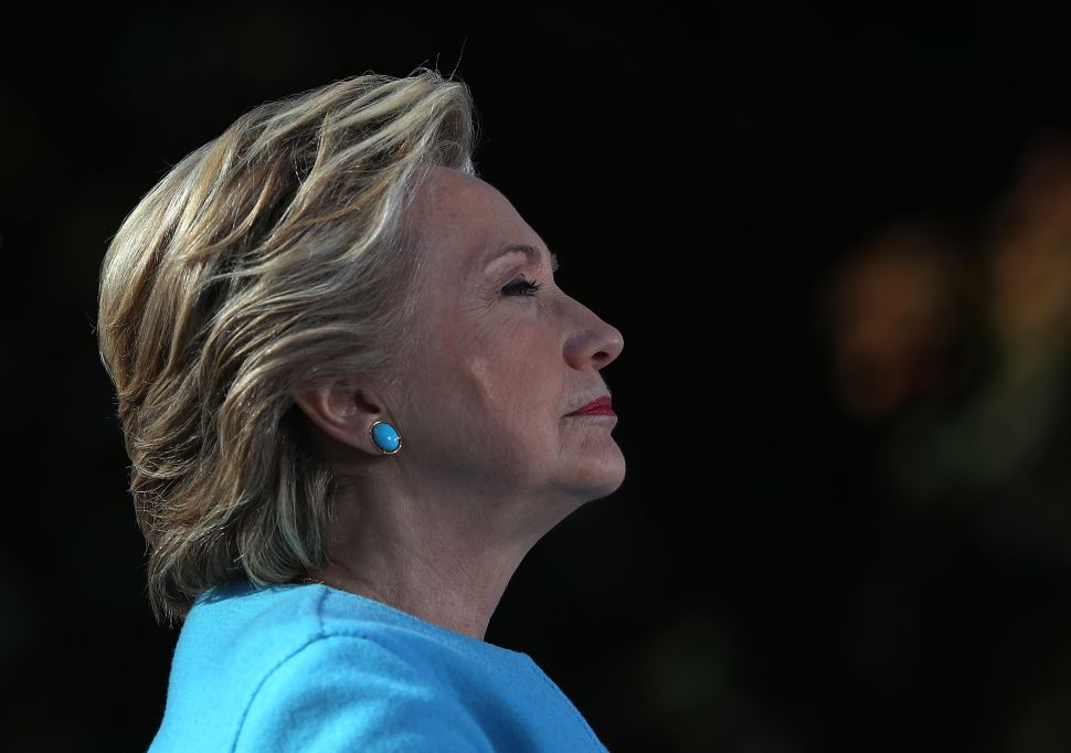 Democratic presidential nominee former Secretary of State Hillary Clinton looks on during a campaign rally at Saint Anselm College on October 24, 2016 in Manchester, New Hampshire. With just over two weeks to go until the election, Hillary Clinton is campaigning in New Hampshire.