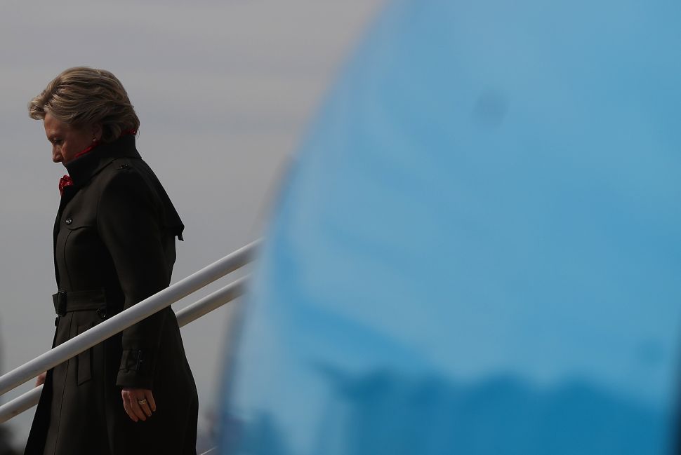 Democratic presidential nominee former Secretary of State Hillary Clinton arrives at Cleveland Burke Lakefront airport on October 31, 2016 in Cleveland, Ohio. With just over a week to go until election day, Hillary Clinton is campaigning in the battleground state of Ohio.