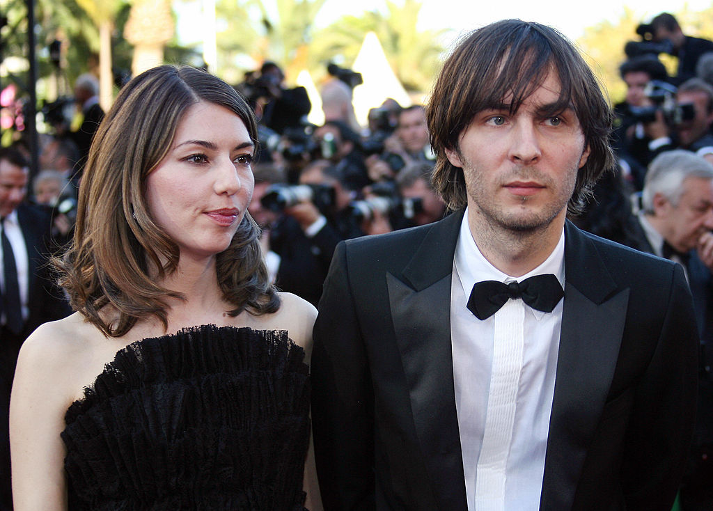 Cannes, FRANCE: (FILES) This file picture taken 24 May 2006 prior the premiere of 'Marie Antoinette' at Cannes festival shows US director Sofia Coppola arriving at the Festival Palace with her companion Phoenix singer Thomas Mars. US People magazine reported 01 June 2006 on its website that Sofia Coppola is pregnant and the child's father is her boyfriend, French rock singer Thomas Mars. AFP PHOTO/FILES/ PASCAL GUYOT (Photo credit should read PASCAL GUYOT/AFP/Getty Images)