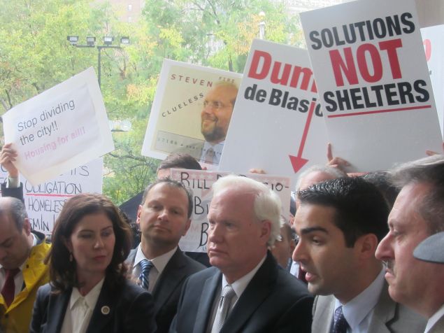 Elected officials from Queens protested at City Hall over what they believe is Mayor Bill de Blasio's failed policy for addressing the city's homelessness crisis.