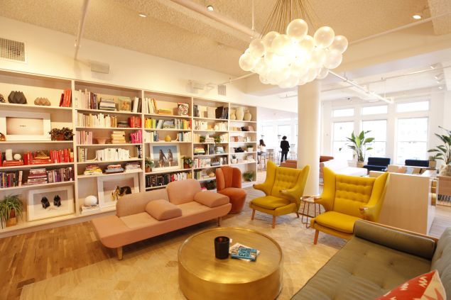 The well-appointed book shelves at The Wing.