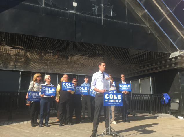 Longtime congressman’s Democratic challenger Dave Cole outside the shuttered Trump Plaza Thursday.