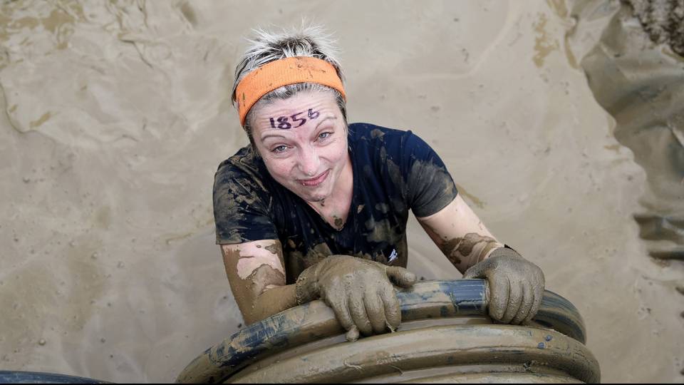 Starting with a barbed wire low crawl, this obstacle ups the ante as Mudders have to drag their muddy bodies up a culvert pipe, and find themselves perched at the end of a 5’ drop into the cold water below. Falling gracefully isn’t really an option, so just hold your nose and take the plunge.
