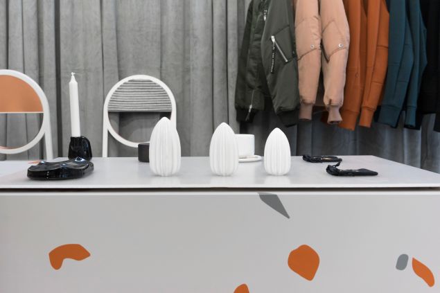 A display of jackets, and other items.