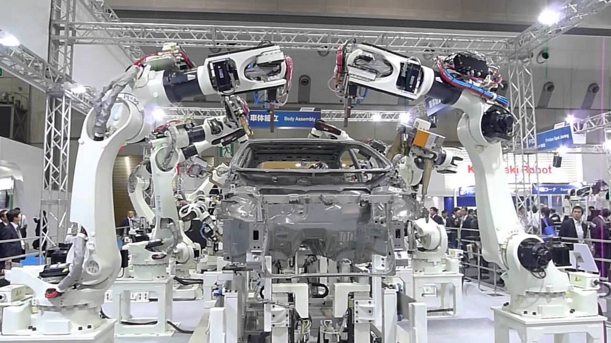 Kawasaki robots making parts.