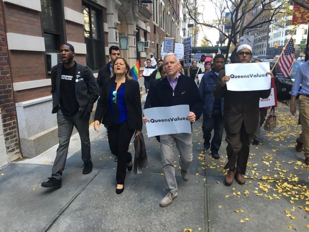 Councilman Jimmy Van Bramer, center, leads Queens protesters in Manhattan, flanked by Councilman Jumaane Williams and Council Speaker Melissa Mark-Viverito.