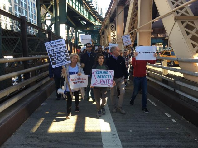 Queens Councilman Jimmy Van Bramer and protesters make their way onto the Queensboro Bridge.