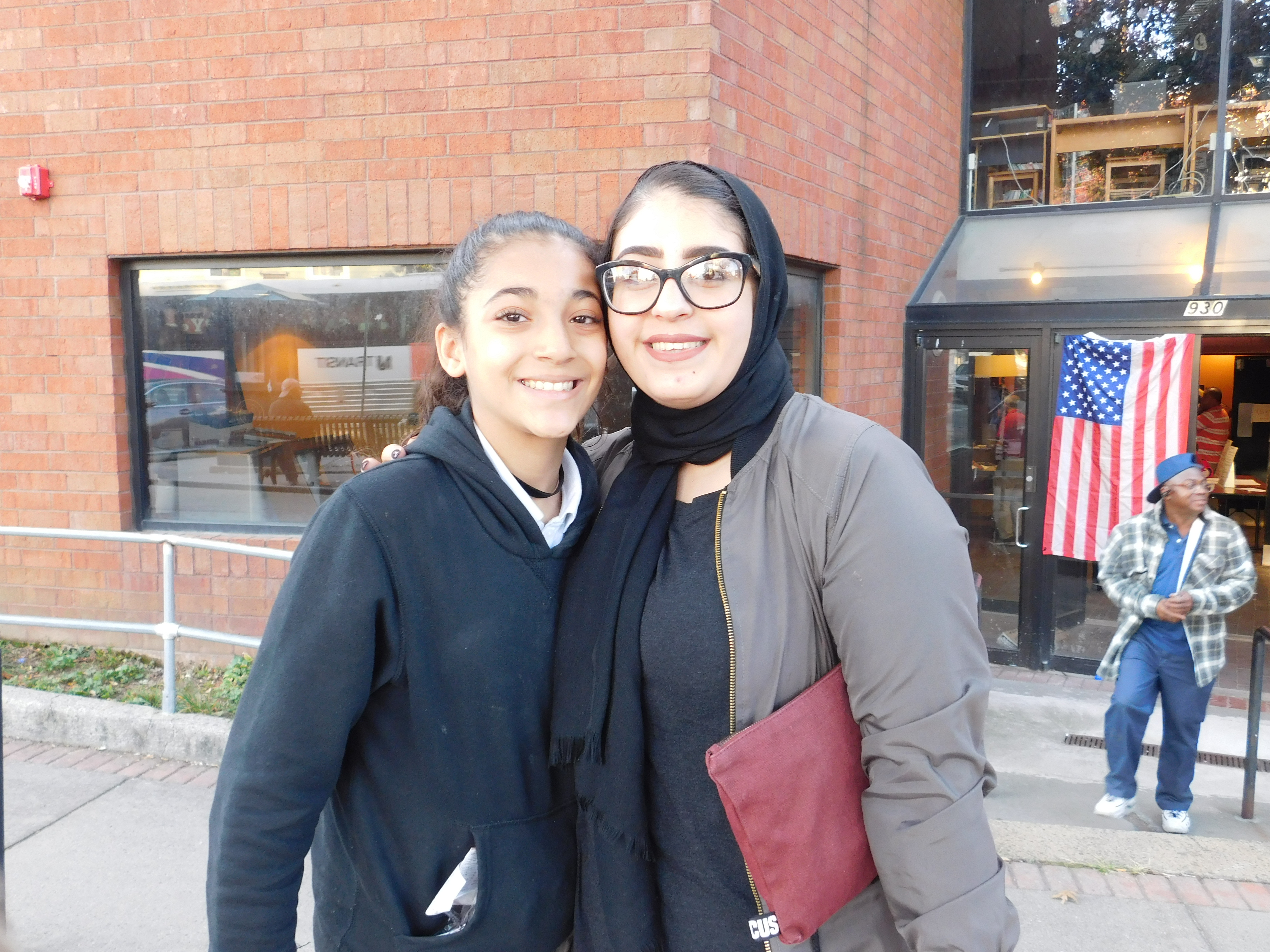 Hanen Hasan (right) and her cousin Baraa Harb outside of a Paterson polling location.