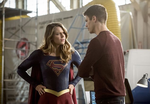 Melissa Benoist as Kara and Grant Gustin as Barry Allen.