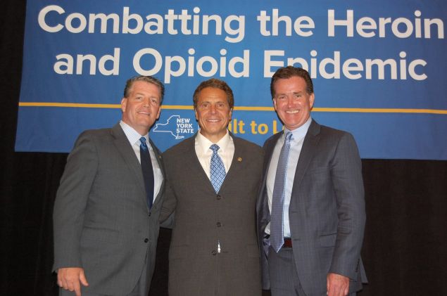 Senate Majority Leader John Flanagan, right, with Gov. Andrew Cuomo, center, and State Senator Terence Murphy.