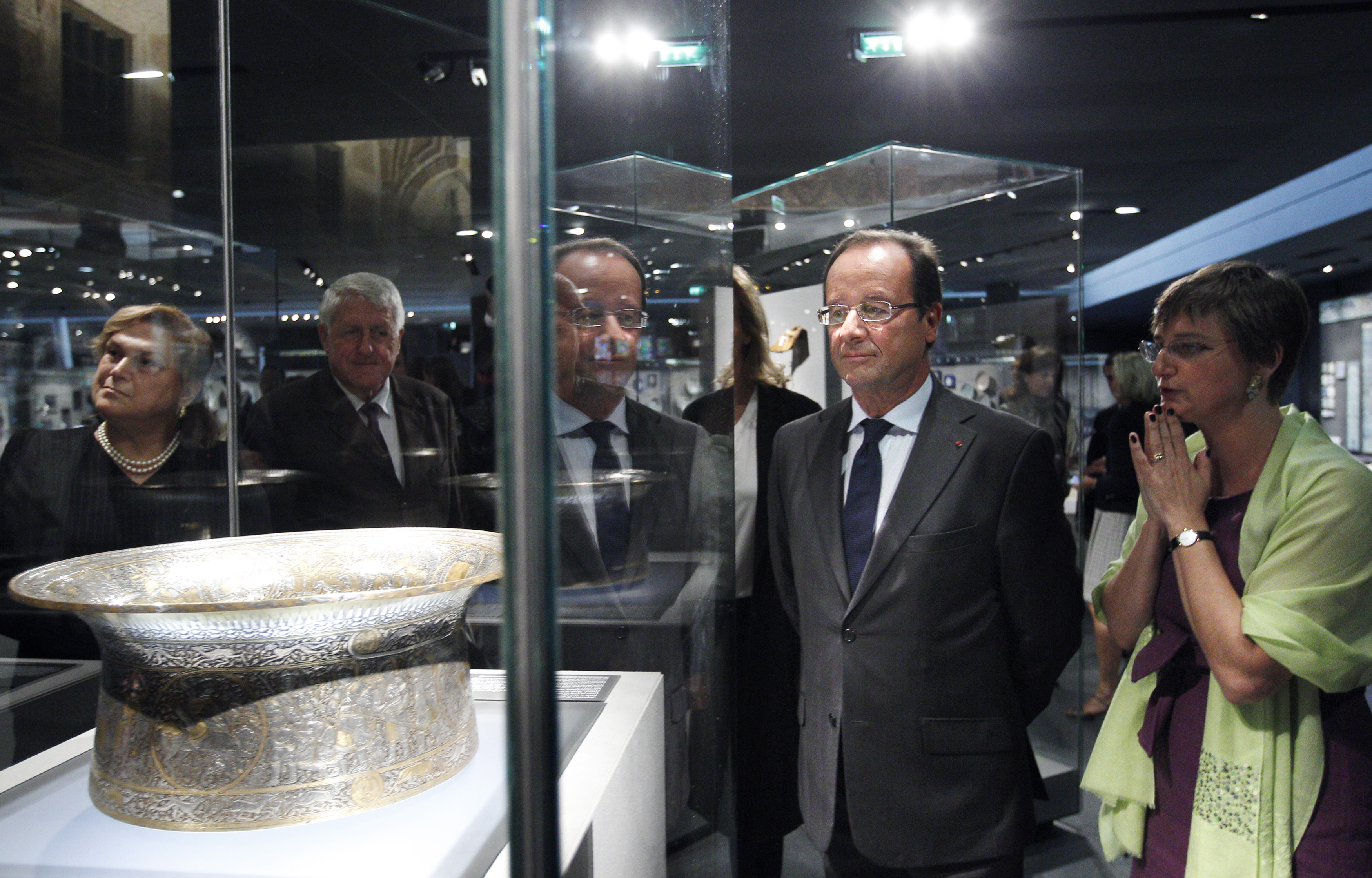 French President Francois Hollande visiting the Department of Islamic Arts galleries at the Louvre in 2012.
