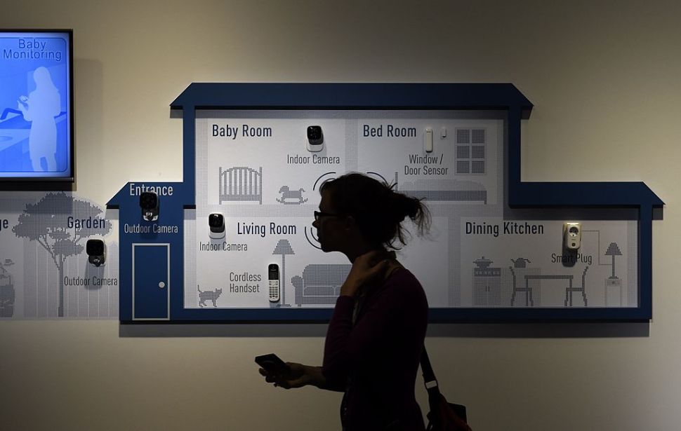 A visitor walks past an installation of a connected home system at the booth of Panasonic during the second press day of the consumer electronics trade fair "Internationale Funk Ausstellung "(IFA) in Berlin September 4, 2014. IFA, one of Europe's biggest showcases of the latest electronic gadgets, is scheduled to open on September 5 and run until September 10, 2014. AFP PHOTO / TOBIAS SCHWARZ (Photo credit should read TOBIAS SCHWARZ/AFP/Getty Images)
