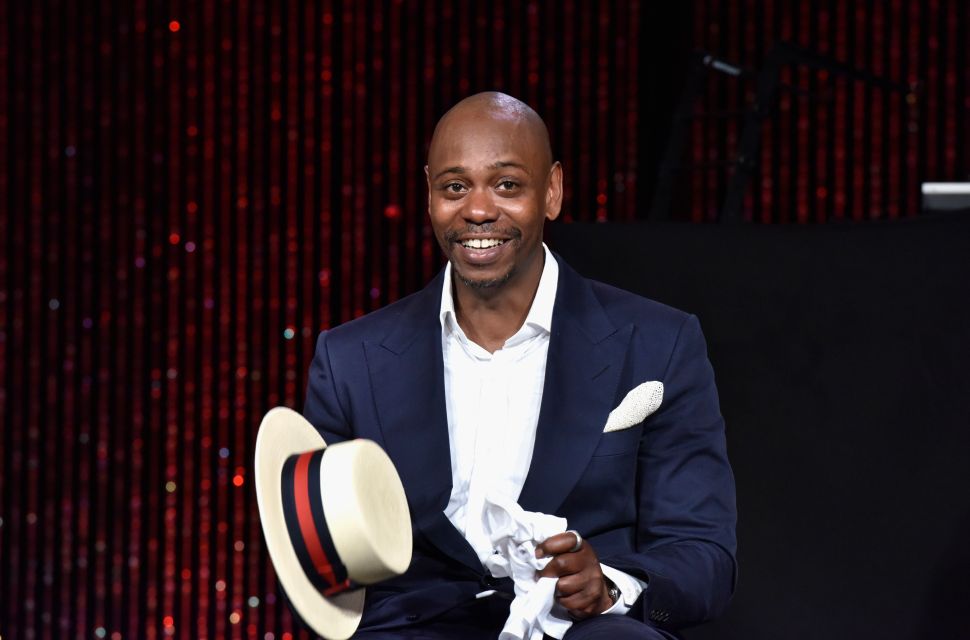 Dave Chappelle speaks on stage as RUSH Philanthropic Arts Foundation Celebrates 20th Anniversary at Art For Life sponsored by Bombay Sapphire Gin at Fairview Farms on July 18, 2015 in Water Mill, New York.