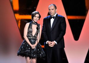 MOUNTAIN VIEW, CA - NOVEMBER 08: Actress Lily Collins (L) and CEO/Co-founder of WhatsApp, Jan Koum speak onstage during the 2016 Breakthrough Prize Ceremony on November 8, 2015 in Mountain View, California. (Photo by Steve Jennings/Getty Images for Breakthrough Prize)