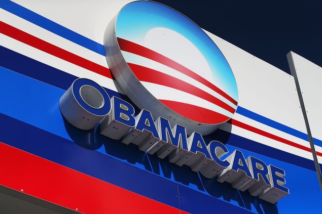 An Obamacare sign is seen on the UniVista Insurance company office on December 15, 2015 in Miami, Florida.
