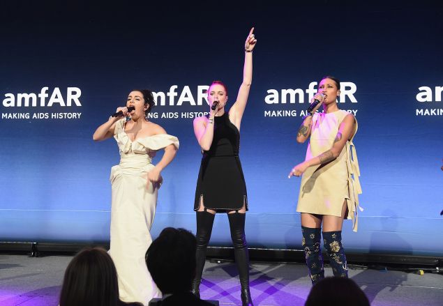 Charli XCX, Caroline Hjelt and Aino Jawo perform onstage during the 2016 amfAR New York Gala at Cipriani Wall Street on February 10, 2016.