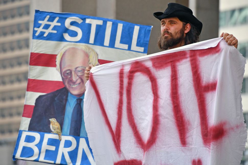 Bernie Sanders supporters gather near City Hall on day three of the Democratic National Convention (DNC) on July 27, 2016 in Philadelphia, Pennsylvania.