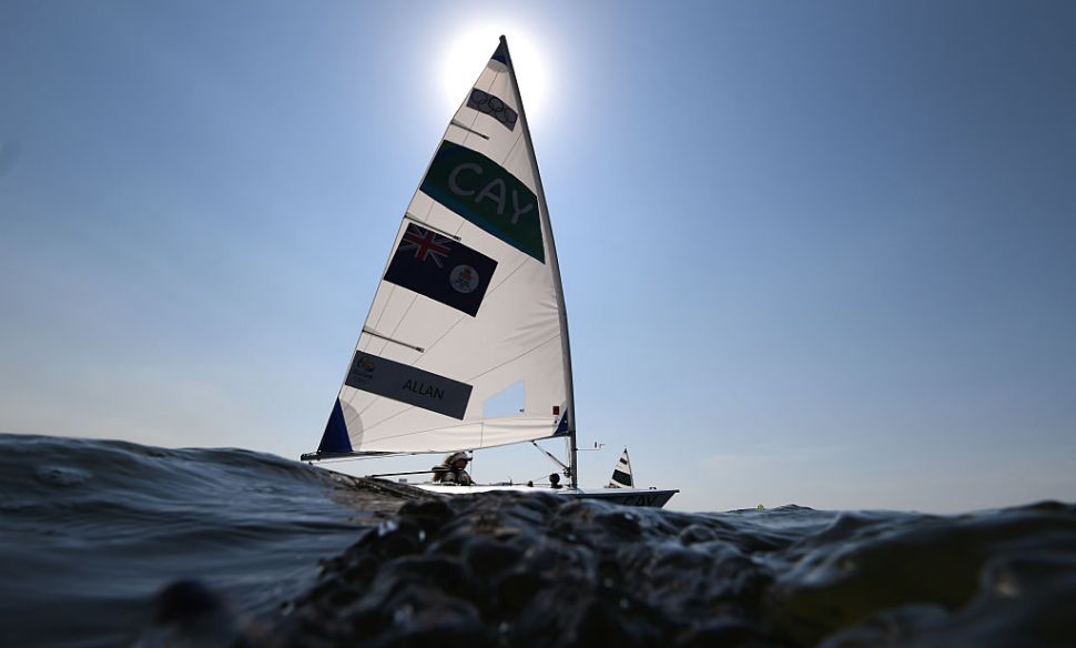 Cayman Islands entry in the Laser Radial sailing class Florence Allan sails during a training session for the 2016 Rio Olympic Games at the Guanabara Bay in Rio de Janeiro, Brazil on August 6, 2016. / AFP / WILLIAM WEST (Photo credit should read WILLIAM WEST/AFP/Getty Images)