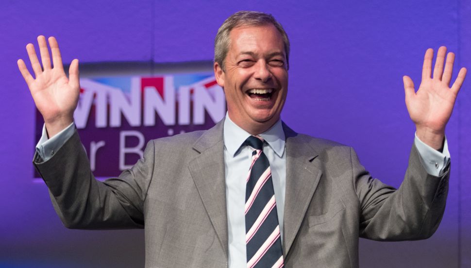 Outgoing UKIP leader Nigel Farage prepares to congratulate MEP Diane James after she was announced as the new leader of UKIP at the Bournemouth B.I.C where the United Kingdom Independent Party are holding their annual conference on September 16, 2016 in Bournemouth, England.
