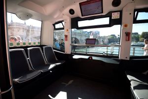 Inside view of a Paris transport authority RATP electric-powered driverless EZ10 minibus, able to carry up to 12 passengers, as it carries out its first test on the banks of the river Seine under the Pont-Neuf bridge on September 24, 2016 in Paris. The RATP carries out its first test of a driverless minibus, in the hope that regular routes for the hi-tech vehicles will be up and running within two years. One of the self-driving shuttle buses, made by French hi-tech firm Easymile, run today along a special circuit in Paris on a pedestrianised street near the River Seine. / AFP / Eric FEFERBERG (Photo credit should read ERIC FEFERBERG/AFP/Getty Images)