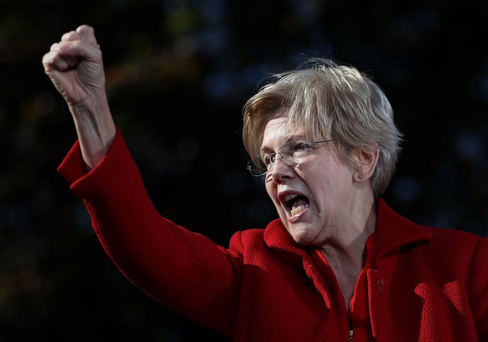Sen. Elizabeth Warren speaks during a campaign rally with democratic presidential nominee former Secretary of State Hillary Clinton at St Saint Anselm College on October 24, 2016 in Manchester, New Hampshire.