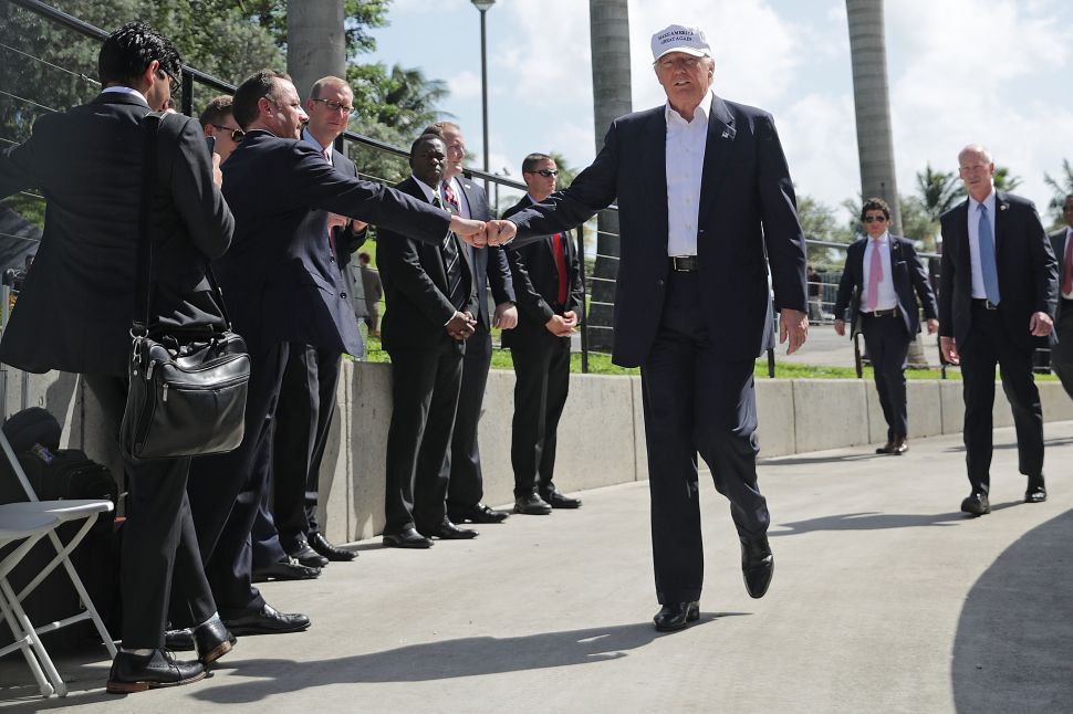 MIAMI, FL - NOVEMBER 02: Republican presidential nominee Donald Trump gives a fist bump to Republican National Committee Chairman Reince Priebus during a campaign rally at Bayfront Park Amphitheater November 2, 2016 in Miami, Florida. With less than a week before Election Day in the United States, Trump and his opponent, Democratic presidential nominee Hillary Clinton, are campaigning in key battleground states that each must win to take the White House.