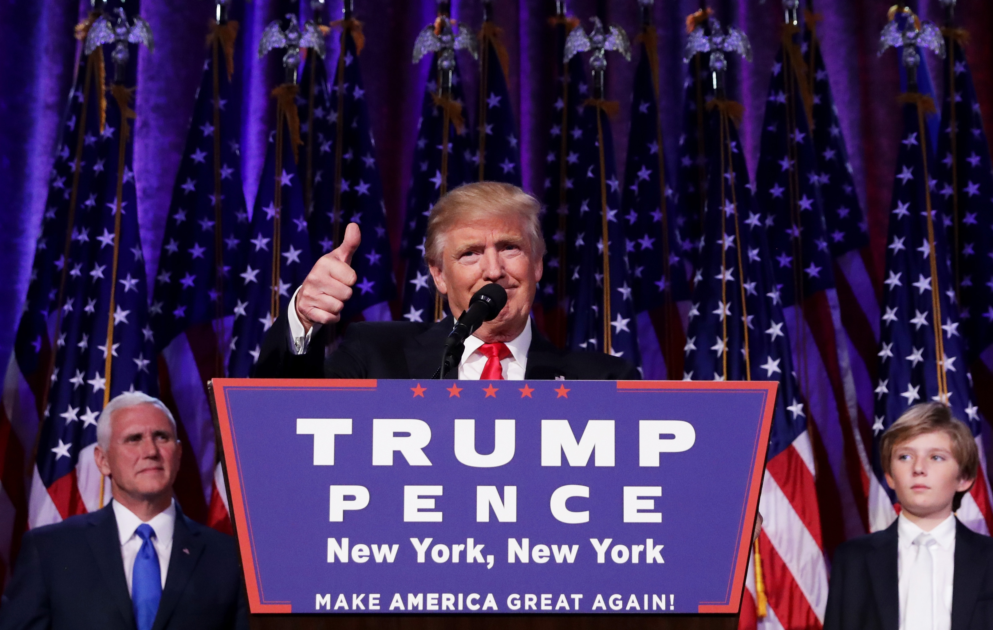 Republican president-elect Donald Trump gives a thumbs up to the crowd during his acceptance speech at his election night event in New York. 