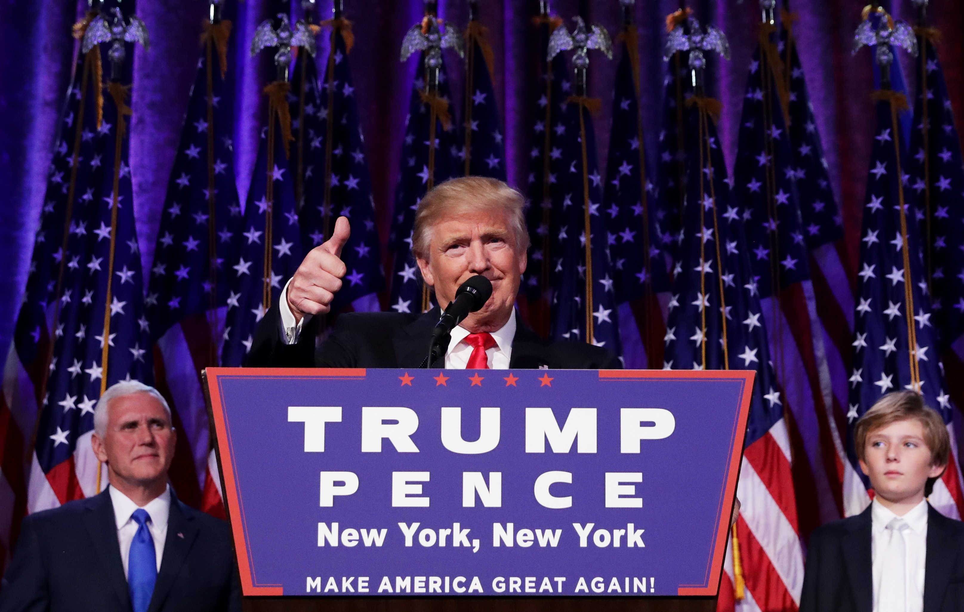 Republican president-elect Donald Trump gives a thumbs up to the crowd during his acceptance speech at his election night event in New York.