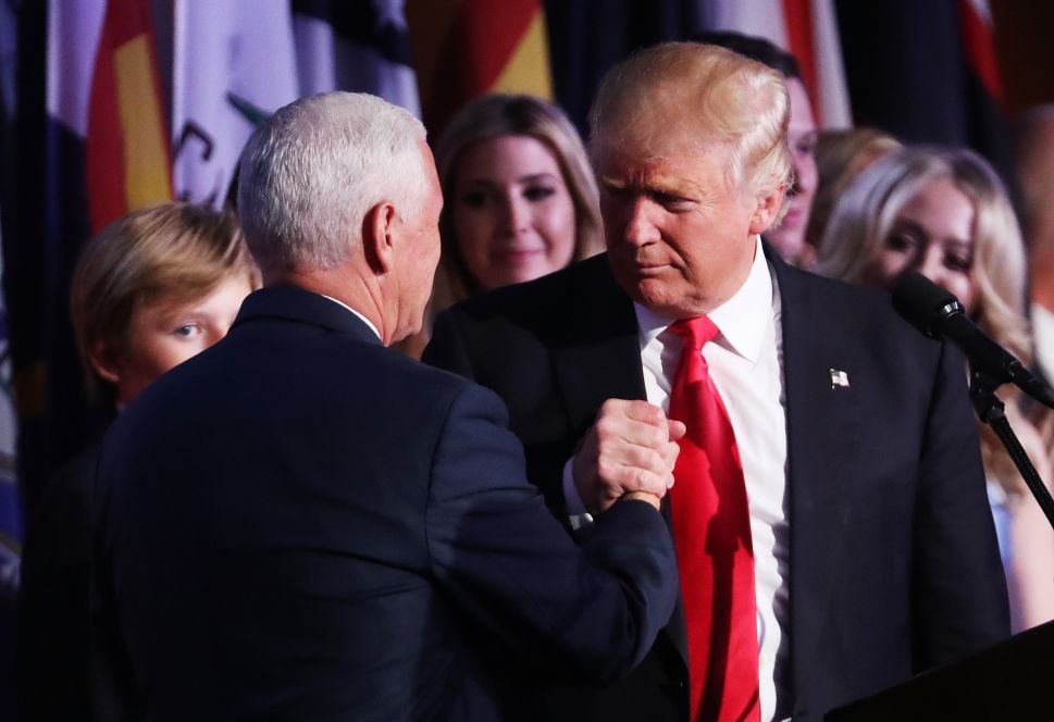 NEW YORK, NY - NOVEMBER 09: Vice president-elect Mike Pence and Republican president-elect Donald Trump shake hands during his election night event at the New York Hilton Midtown in the early morning hours of November 9, 2016 in New York City. Donald Trump defeated Democratic presidential nominee Hillary Clinton to become the 45th president of the United States.