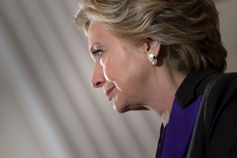 Former Democratic US Presidential candidate Hillary Clinton pauses while speaking to supporters at the New Yorker Hotel after her defeat last night in the presidential election November 9, 2016 in New York.
