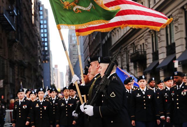 Members of the U.S. military march in the nation's largest Veterans Day Parade in New York City on November 11, 2016 in New York City. Known as 'America's Parade' it features over 20,000 participants, including veterans of numerous eras, military units, businesses and high school bands and civic and youth groups.