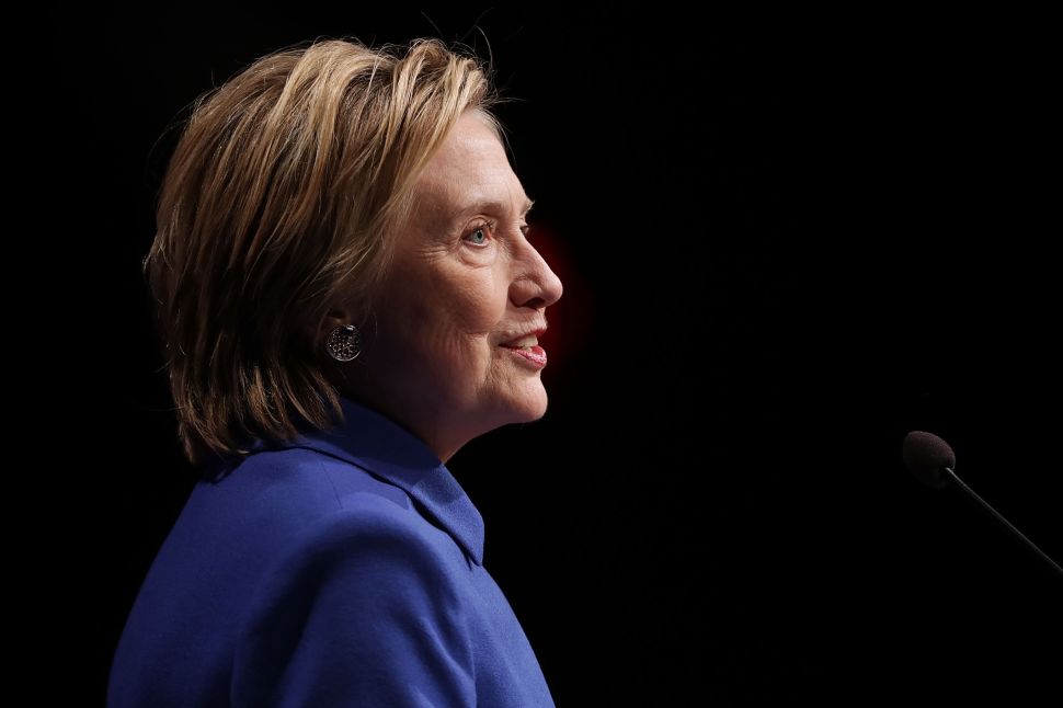 Former Secretary of State and former Democratic Presidential nominee Hillary Clinton delivers remarks while being honored during the Children's Defense Fund's Beat the Odds Celebration at the Newseum November 16, 2016 in Washington, DC. This was the first time Clinton had spoken in public since conceeding the presidential race to Republican Donald Trump.