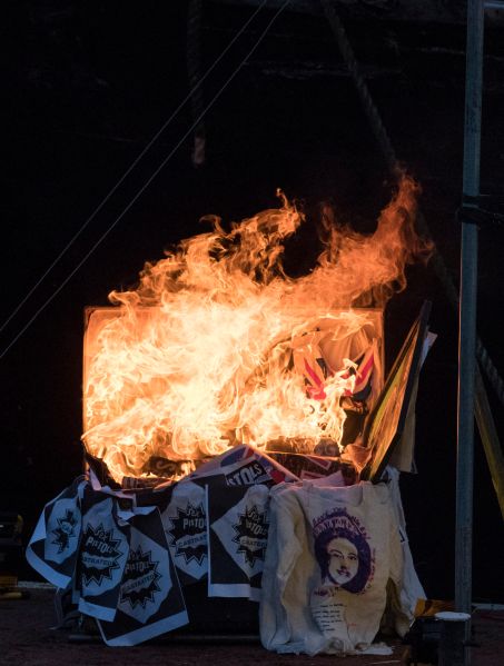 LONDON, ENGLAND - NOVEMBER 26: Joe Corre, the son of Vivienne Westwood and Sex Pistols creator Malcolm McLaren (not in picture) burns his entire £5 million punk collection on November 26, 2016 in London, England. Joe Corre burnt the rare punk memorabilia in protest saying punk has no solutions for today's youth and is 'conning the young'. (Photo by John Phillips/Getty Images)