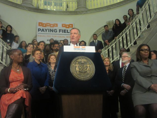 Mayor de Blasio speaks at a press conference in the City Hall rotunda.