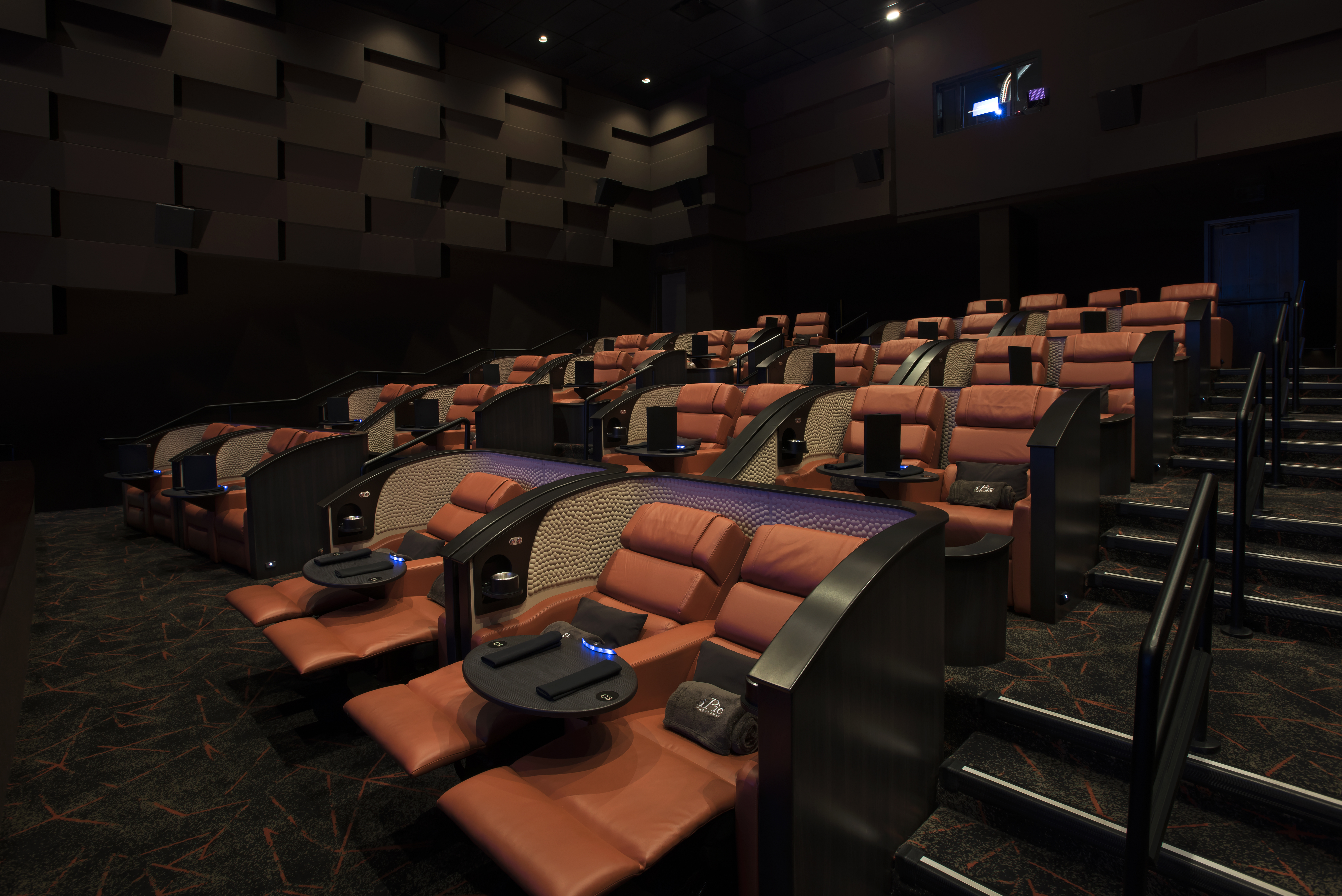iPic offers pod-like seating and in-movie service.