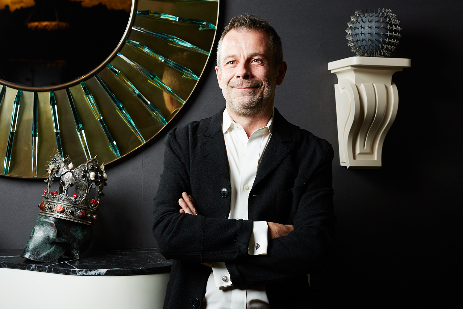 Benoist Drut, interior designer and partner with Mason Gerard gallery inside of his booth, Salon Art + Design Fair at the Park Avenue Armory, New York, New York, November 11th, 2016. Yvonne Albinowski/For New York Observer
